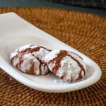 chocolate crinkle cookies on a small plate