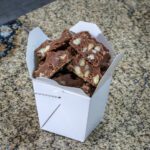 chocolate hazelnut fudge in a take-out box