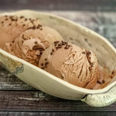 homemade chocolate ice cream in a pottery serving dish.