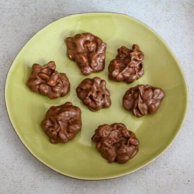 chocolate peanut clusters on a plate