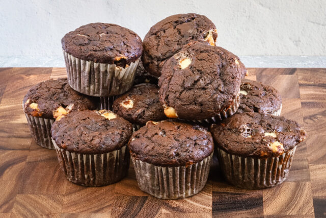 Chocolate zucchini muffins with white chocolate chips, baked and ready to enjoy.