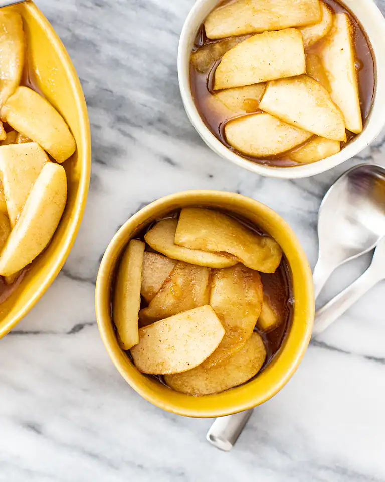 Fresh baked apple slices in warm caramel sauce.