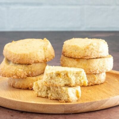 citrus cardamom sable cookies on a plate