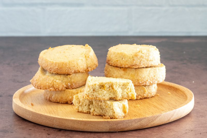 citrus cardamom sable cookies on a plate