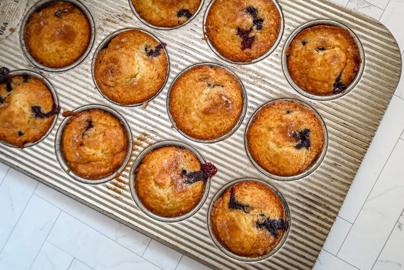 Freshly baked moist blueberry muffins.