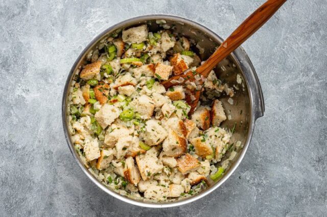 Stuffing ingredients combined in a bowl.