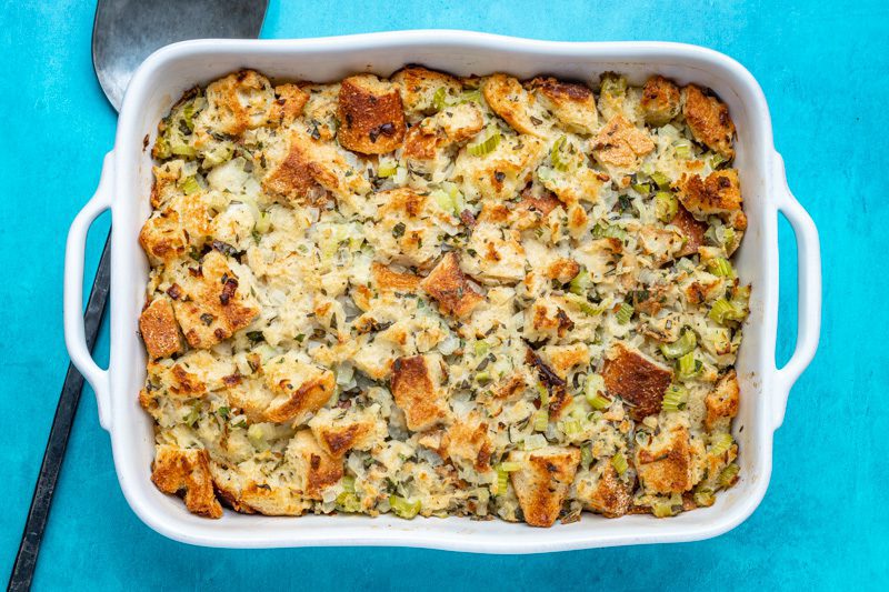 bread stuffing in a large baking dish ready to serve