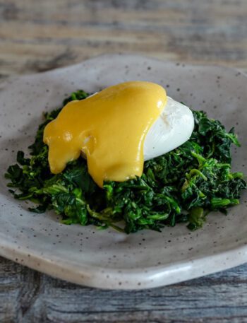 classic hollandaise sauce on a poached egg
