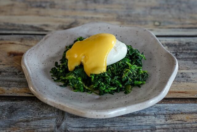 classic hollandaise sauce on a poached egg