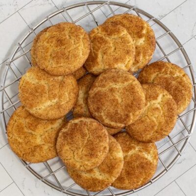 snickerdoodle cookies on a cooling rack