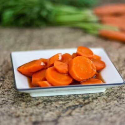 cointreau orange glazed carrots on a plate