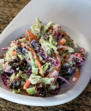 colorful coleslaw with mayonnaise and sour cream dressing