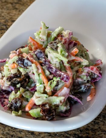 colorful coleslaw with mayonnaise and sour cream dressing