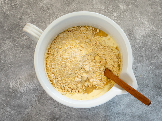 cornbread casserole prep, mixing Jiffy Mix