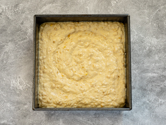 cornbread casserole prep, spread in the pan