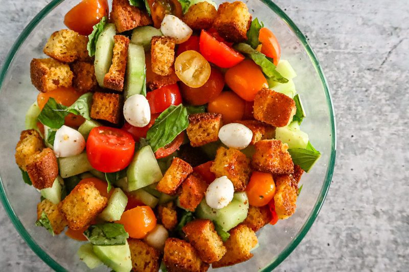 a salad with cornbread croutons