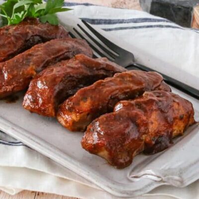 country style ribs with maple bbq sauce on a platter