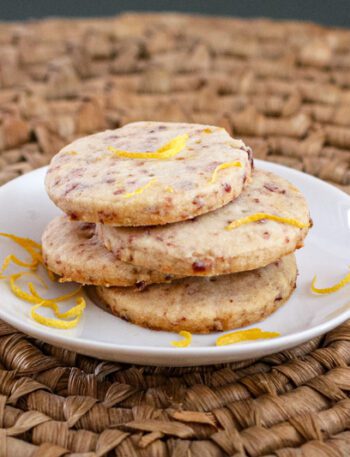 cranberry orange shortbread cookies on a plate