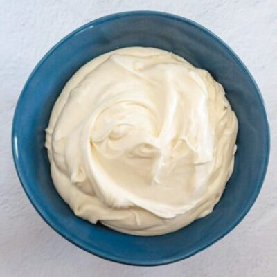 a large bowl with homemade cream cheese frosting