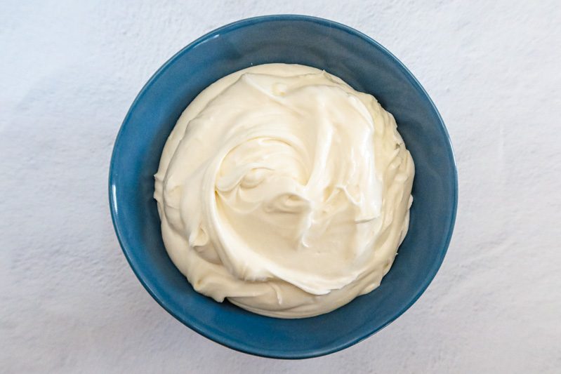 a large bowl with homemade cream cheese frosting