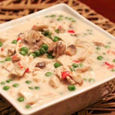 A serving dish with creamed chicken