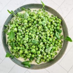 creamed peas in a serving bowl