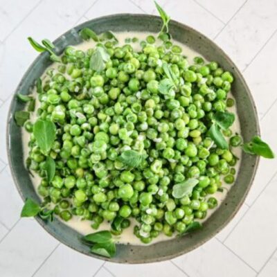 creamed peas in a serving bowl