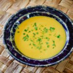 butternut squash soup in a wide bennington pottery bowl