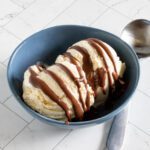 easy keto chocolate sauce drizzled on ice cream