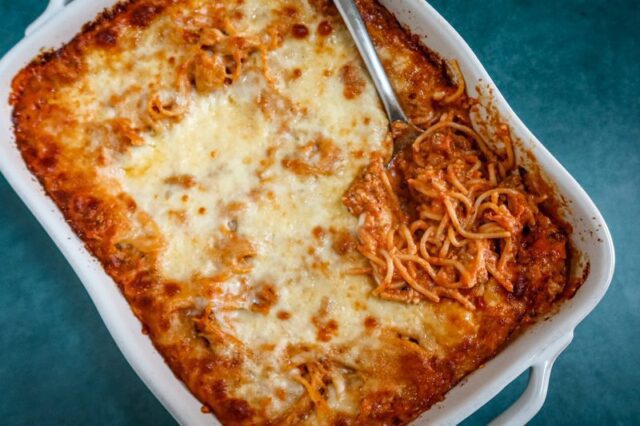 creamy spaghetti casserole in a baking dish