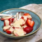 Fresh strawberries topped with creamy vanilla sauce.