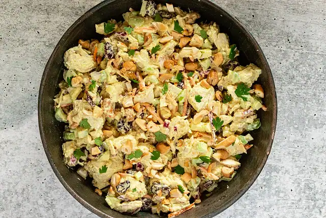 Serving bowl with curried chicken salad.