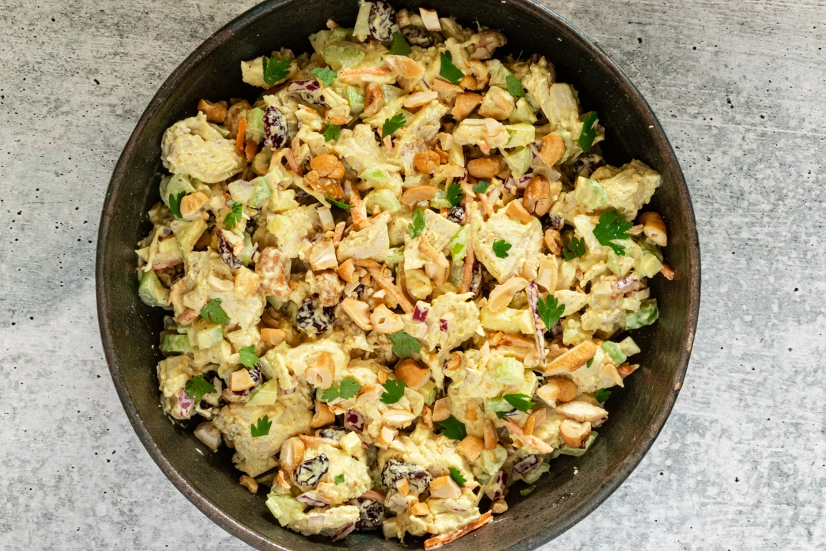 Serving bowl with curried chicken salad.