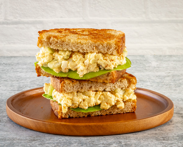 Egg salad sandwich with lettuce.