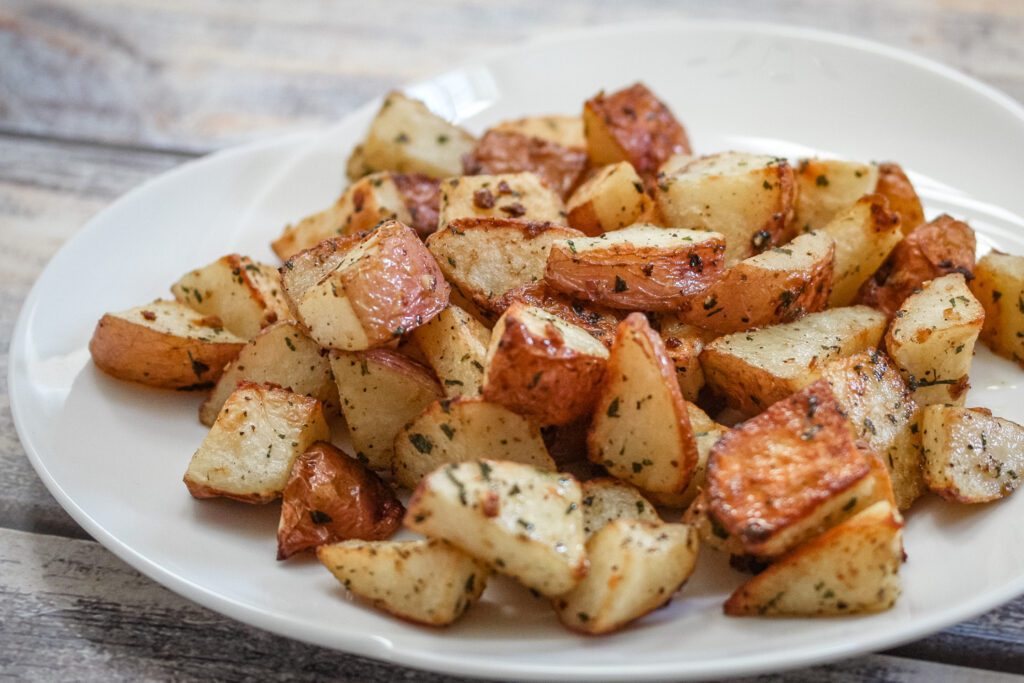 roasted potatoes on a large serving plate