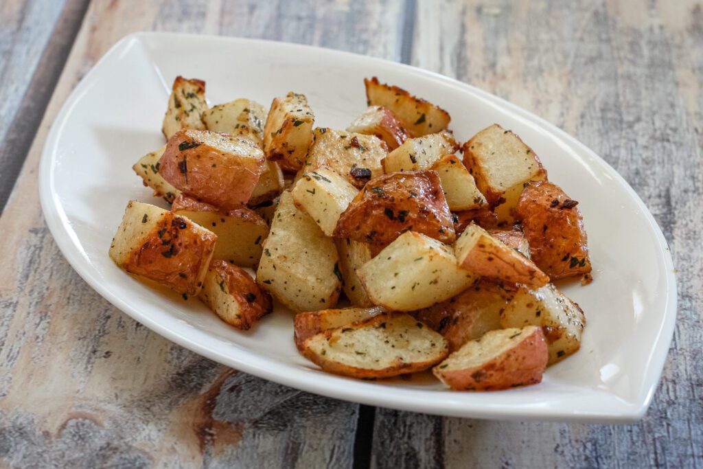 roasted potatoes on a serving plate