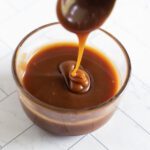 homemade caramel sauce in a jar