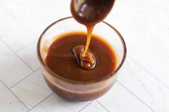 homemade caramel sauce in a jar