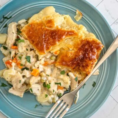 Chicken pot pie with puff pastry crust.