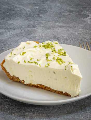 A slice of easy key lime pie on a dessert plate
