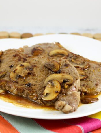 Steak Diane with sauce on a serving platter