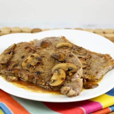 Steak Diane with sauce on a serving platter