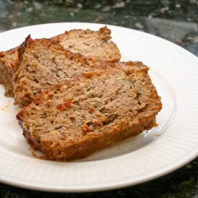 slices of meatloaf on a plate, an everyday meatloaf