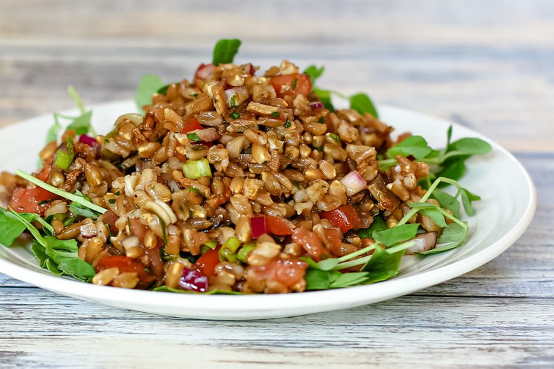 farro salad with tomatoes, onions, and bacon