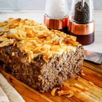 A french onion meatloaf with Gruyere cheese and crispy onion topping.