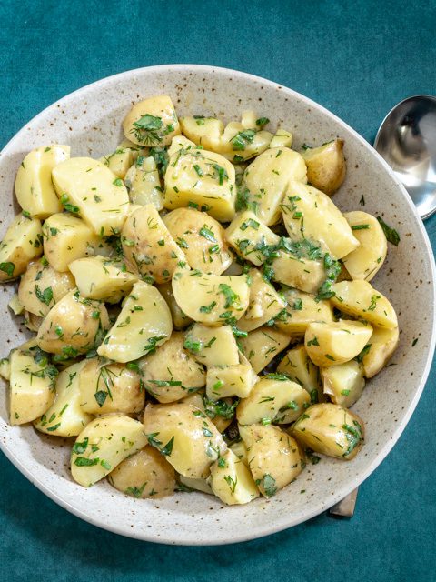 french potato salad in a serving bowl