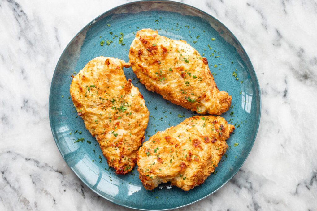 fried chicken breasts on a plate