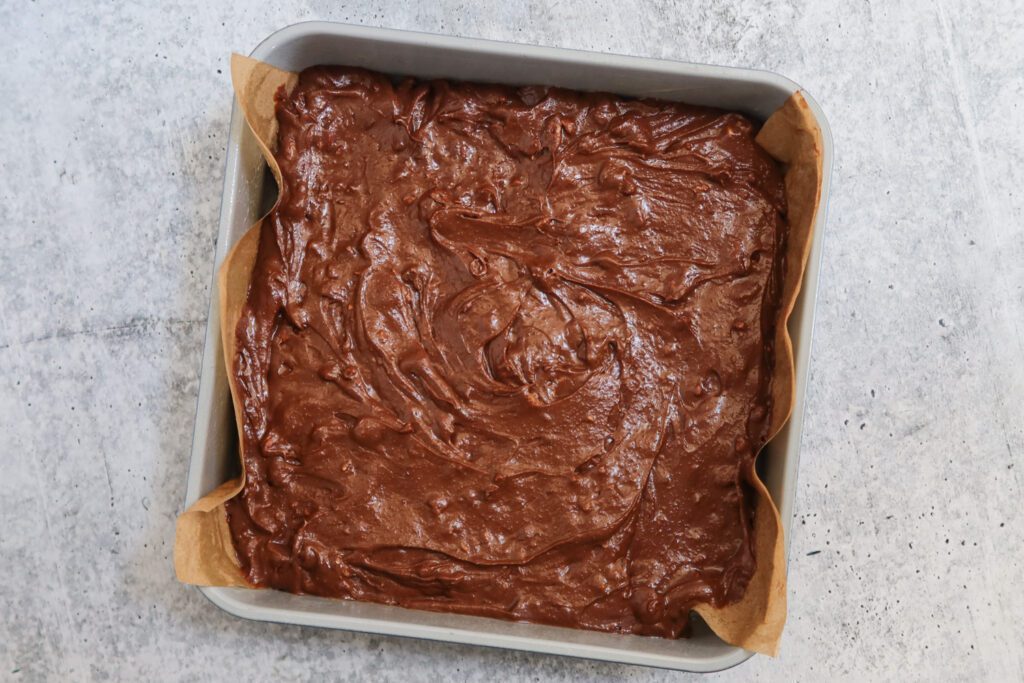 fudgy brownie batter in the pan