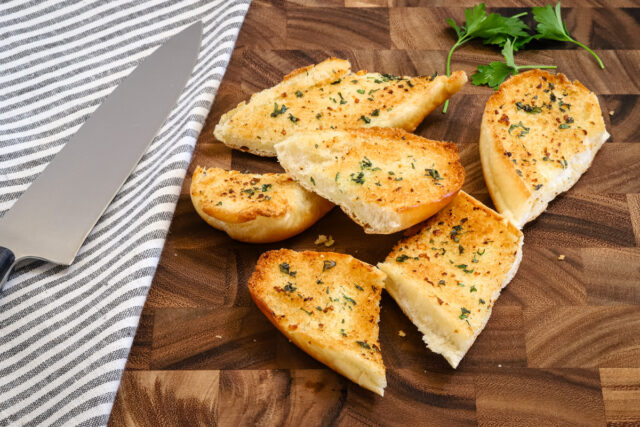 Toasty browned garlic bread made with fresh garlic and parsley.