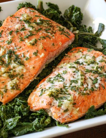 garlic and herb salmon on a bed of spinach